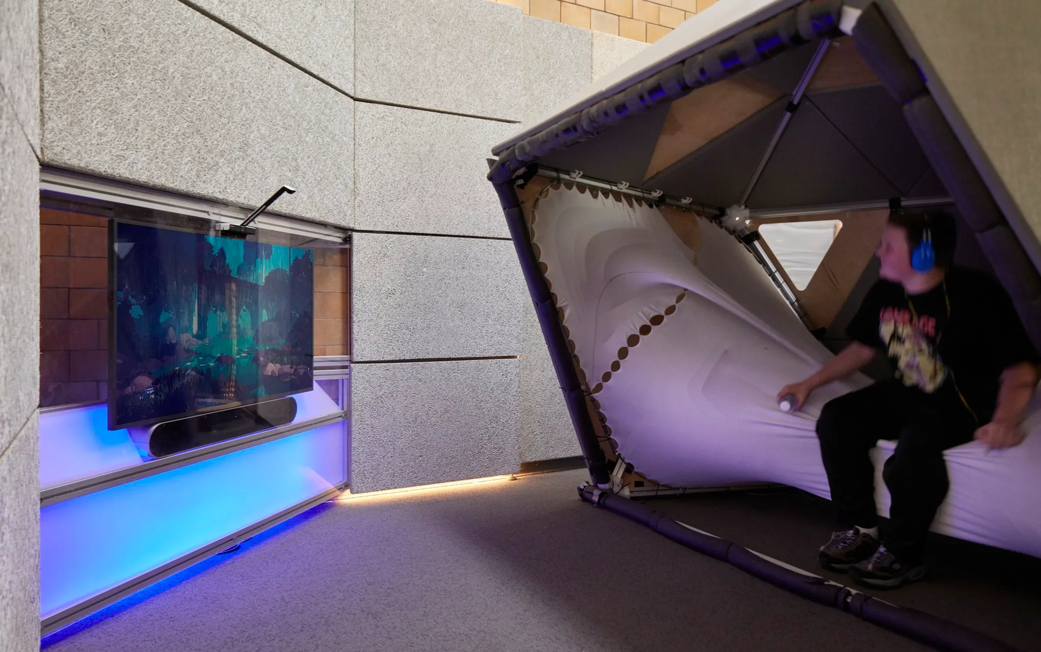 Interactive media wall creating an immersive sensory environment